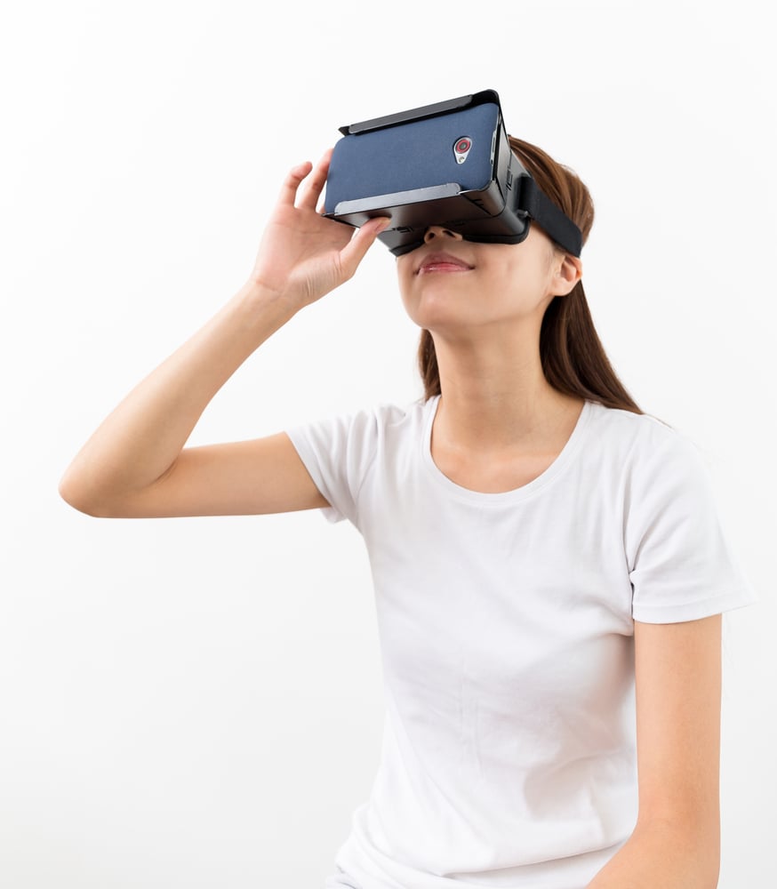 Young woman watch with VR device