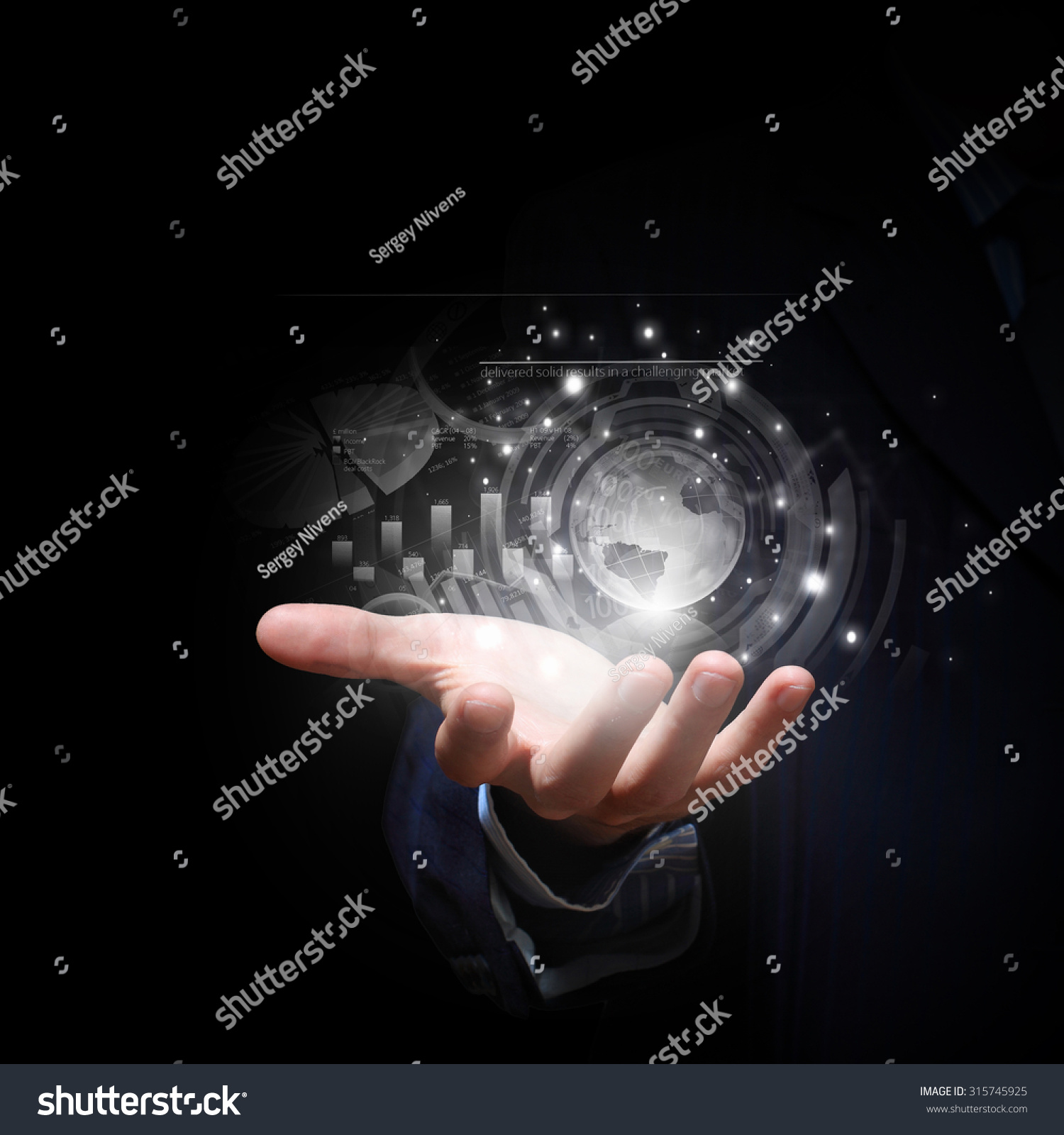 stock-photo-close-up-of-businessman-hand-showing-digital-planet-315745925